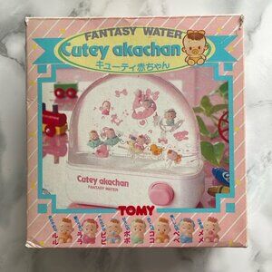Vintage - Cutey akachan FANTASY WATER by TOMY in AS IS CONDITION. READ PLEASE